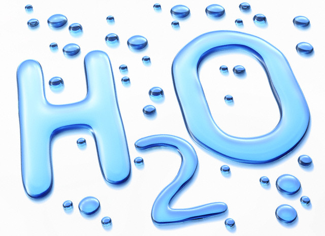 H2O Symbol in Water --- Image by © Matthias Kulka/Corbis